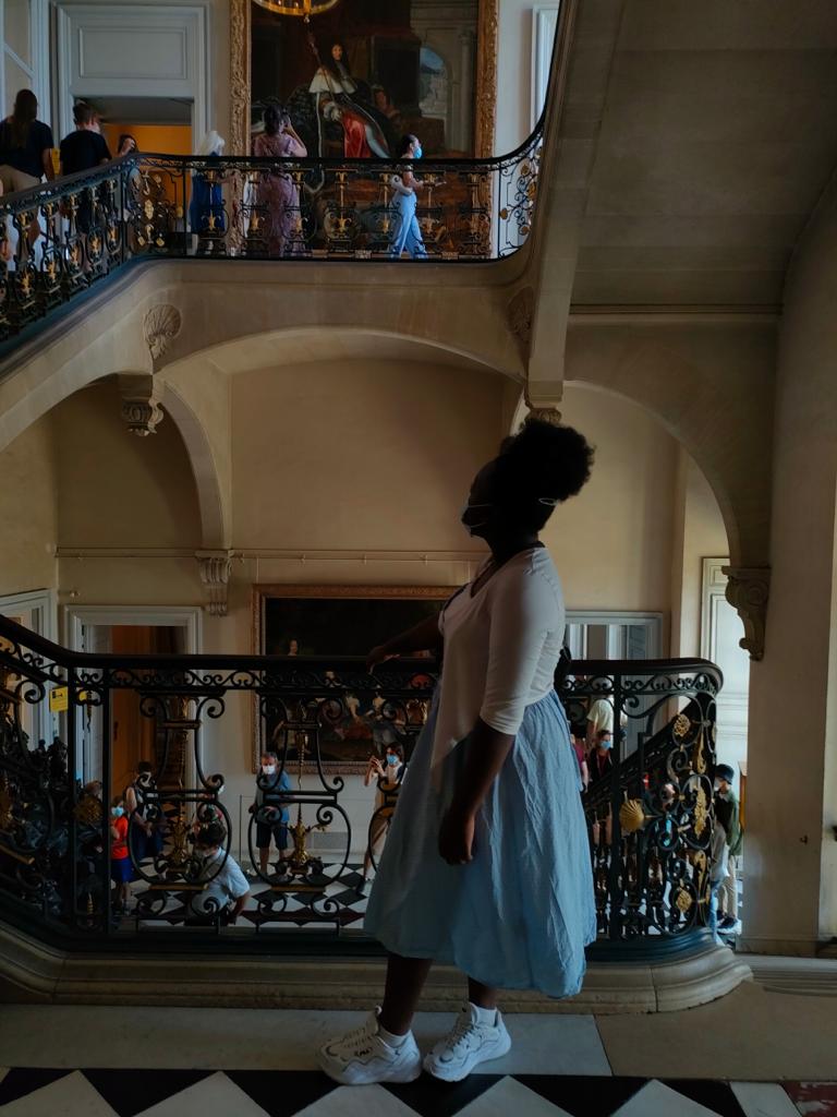 Martha inside the castle Versailles, the largest castle in France. This castle has the most famous room called the "Hall of Mirrors" Martha inside the castle Versailles, the largest castle in France. This castle has the most famous room called the "Hall of Mirrors"