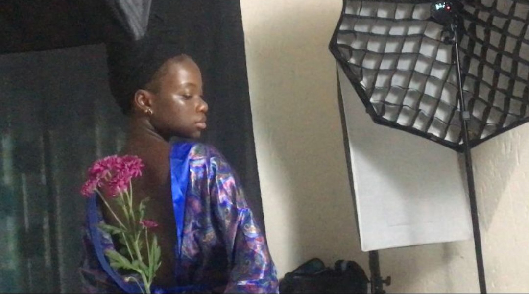 A Behind the scenes Picture of Yollande during her first professional photoshoot A Behind the scenes Picture of Yollande during her first professional
photoshoot